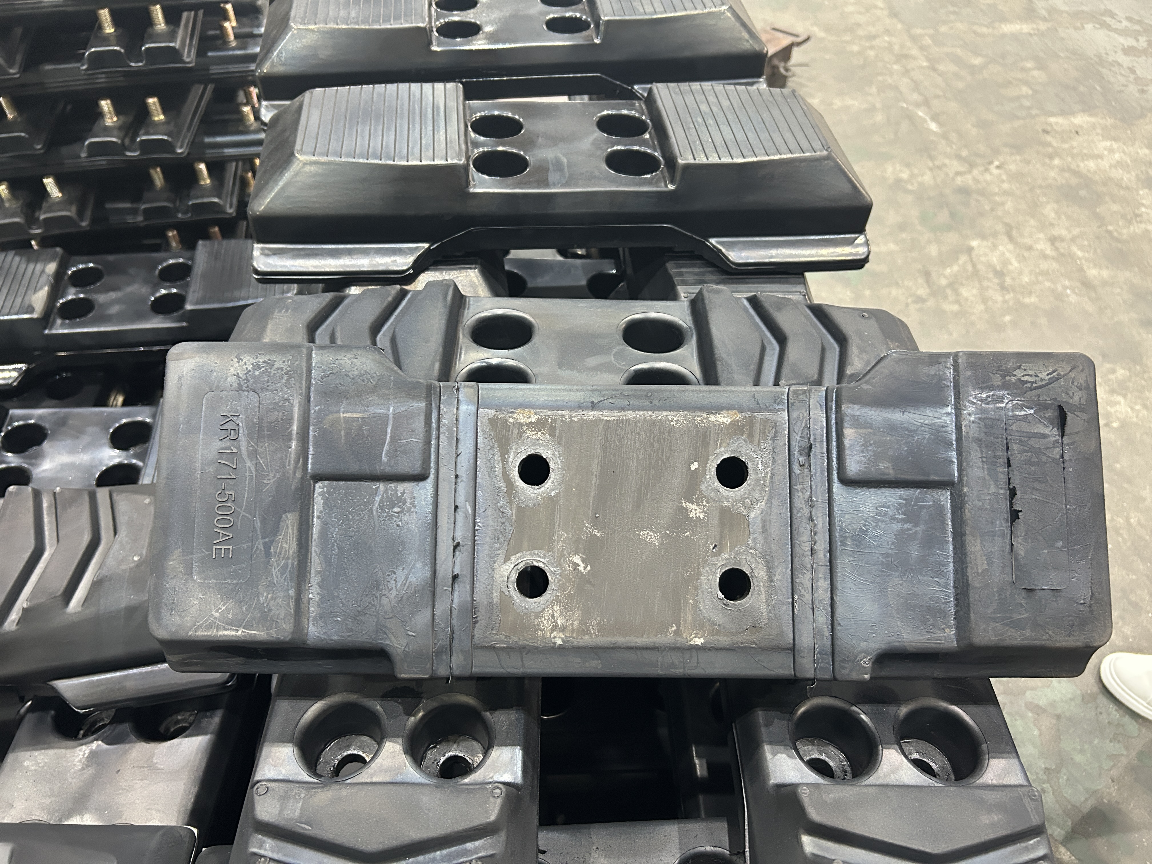 chain on rubber track pads